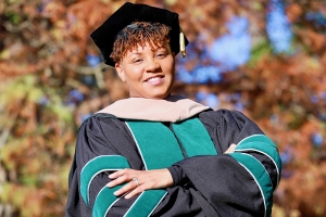Charlotte DBA graduate fulfills decades-long dream