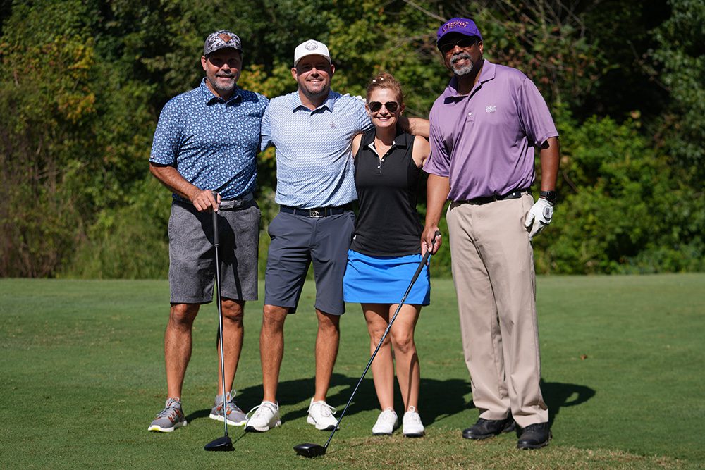 Foursome of golfers