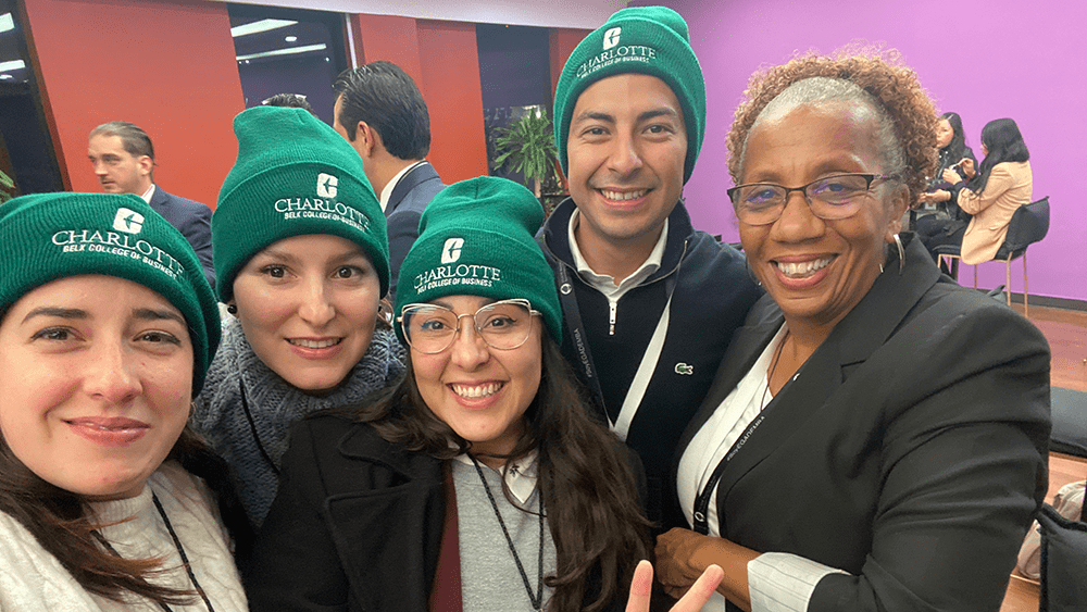 EGADE students pose with Belk College staff member Deidre Coleman during a visit to Monterrey in 2022.