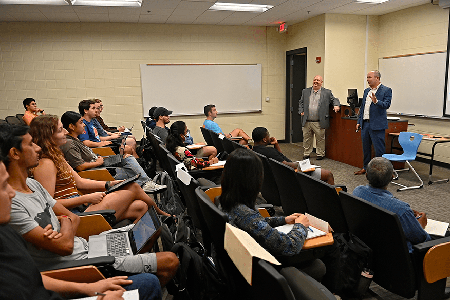 CFO Mark Harvey ‘05 and Director of Operations Corey Mabry from VS America presenting to the Operations 3208 (Supply Chain Management) class.