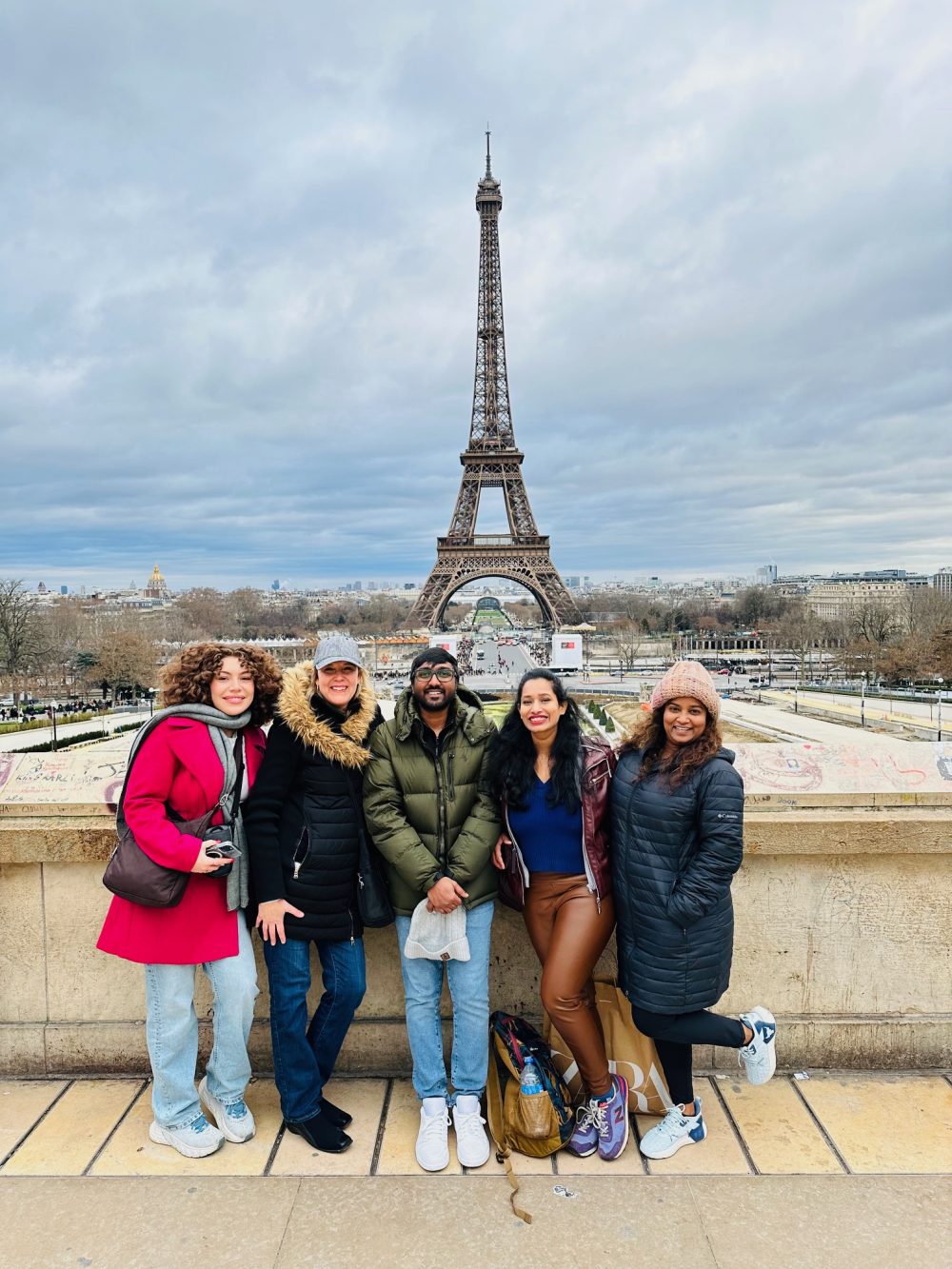 Belk College of Business students visiting the Eiffel Tower in Paris as part of their study abroad trip