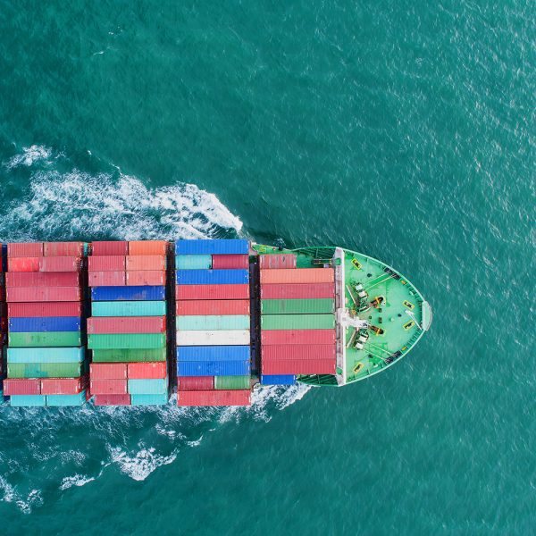 UNC Charlotte Operations and Supply Chain Management; Aerial view container ship to sea port loading container for import export or transportation. shipping business logistic. Trade Port and Shipping cargo to harbor, International transportation.