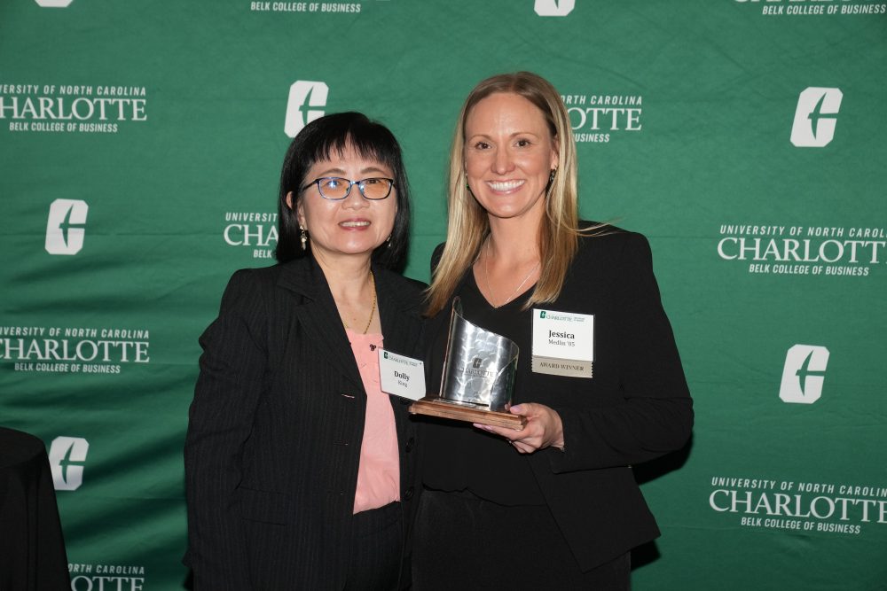 Signature event: Belk College Alumni Awards. Belk College of Business Interim Dean Dolly King and award winner alumna Jessica Medlin '05.