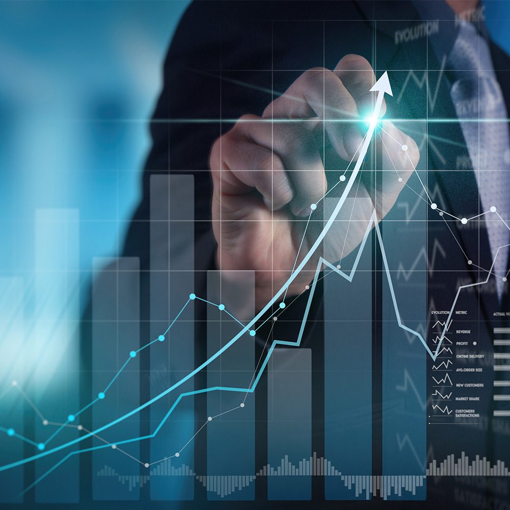 Undergraduate programs in finance, finance concentration. Person drawing a mixed line and bar finance chart on a grid with a light pen. 