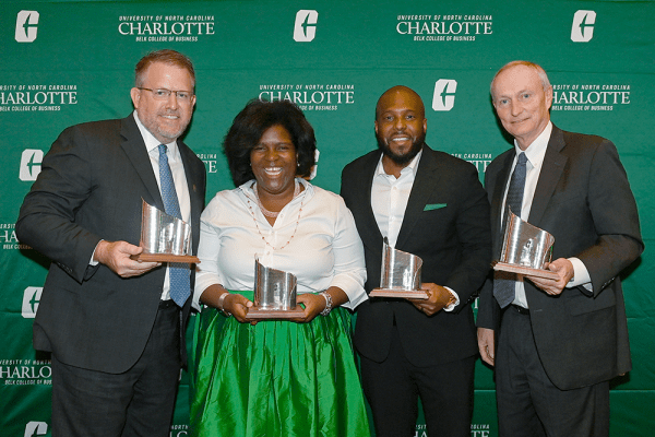 2024 Belk College of Business Alumni Award winners Darin Stafford '94, Kimberly Moore-Wright ’95, Kwame Molden ‘12 and Henry Atkins