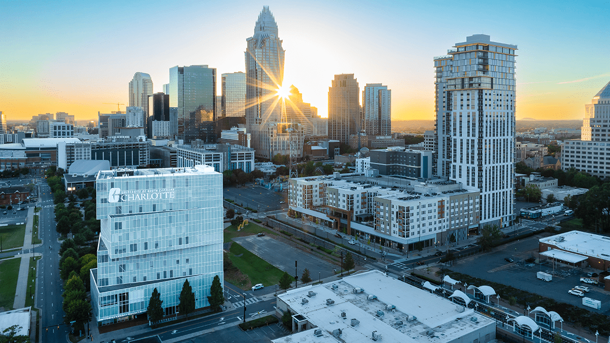 Dubois Center and Uptown Charlotte at sundown; faculty research at the Belk College of Business