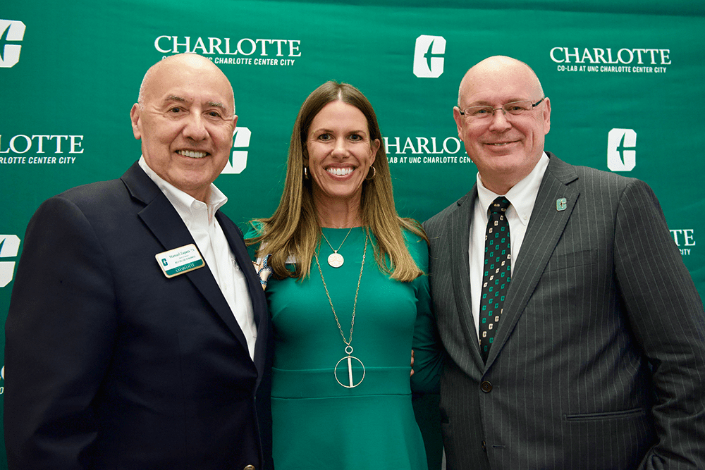 Manuel Zapata '72, Julie Harris '00 and Dean Richard Buttimer