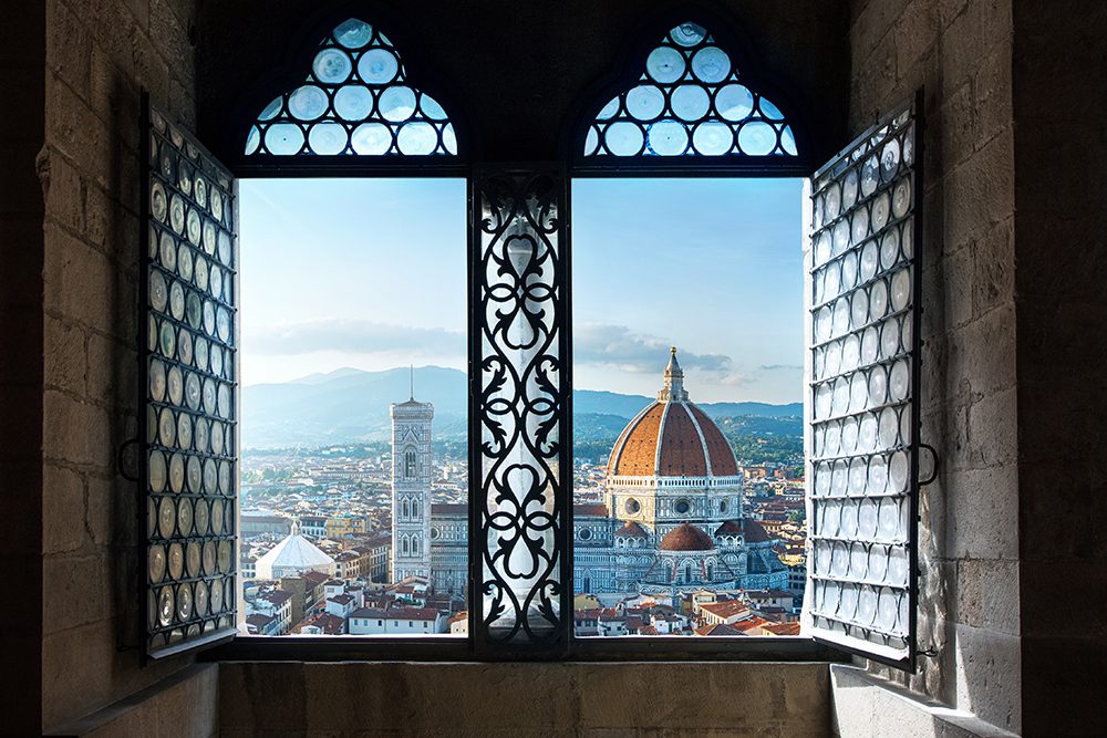 View from an old window on the Duomo Basilica di Santa Maria del Fiore. Florence, Italy. Collage of the historical theme and the theme of travel.