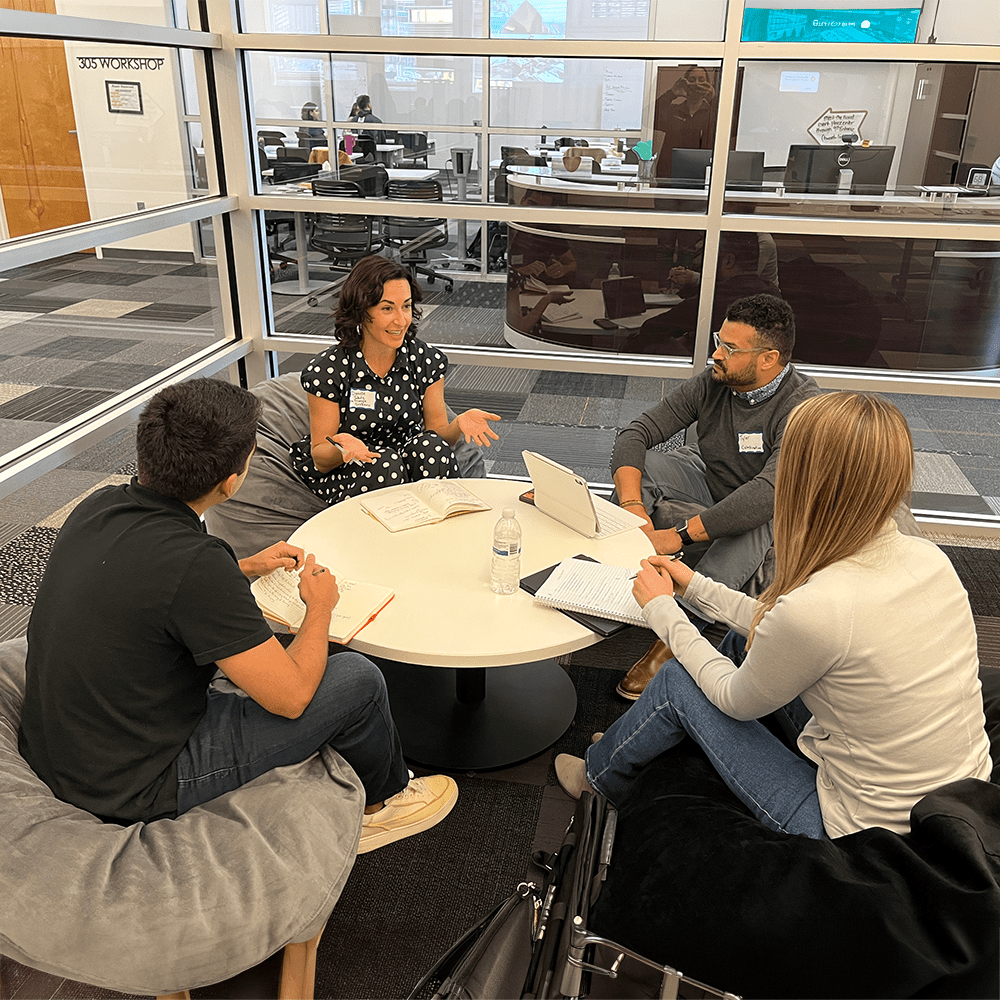 Entrepreneurs discussing projects at CO-LAB at UNC Charlotte Center City