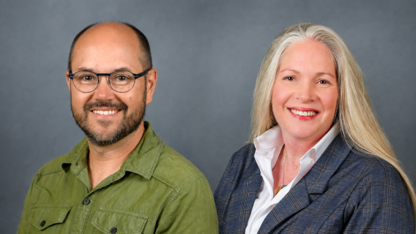 Glenn Dutcher, associate professor of economics and director of the M.S. in Economics program, and Krista Saral, associate professor of economics
